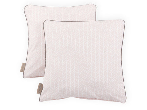 Housse de coussin motif plume blanche sur rose