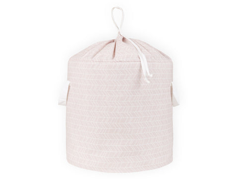 Panier à jouets motif plume blanche sur rose