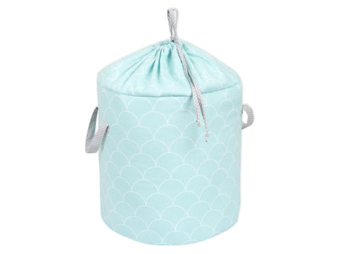 Panier à jouets demi-cercles blanc sur pastel menthe