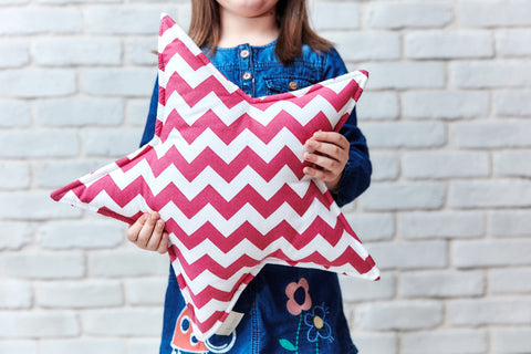 Coussin étoile chevron magenta